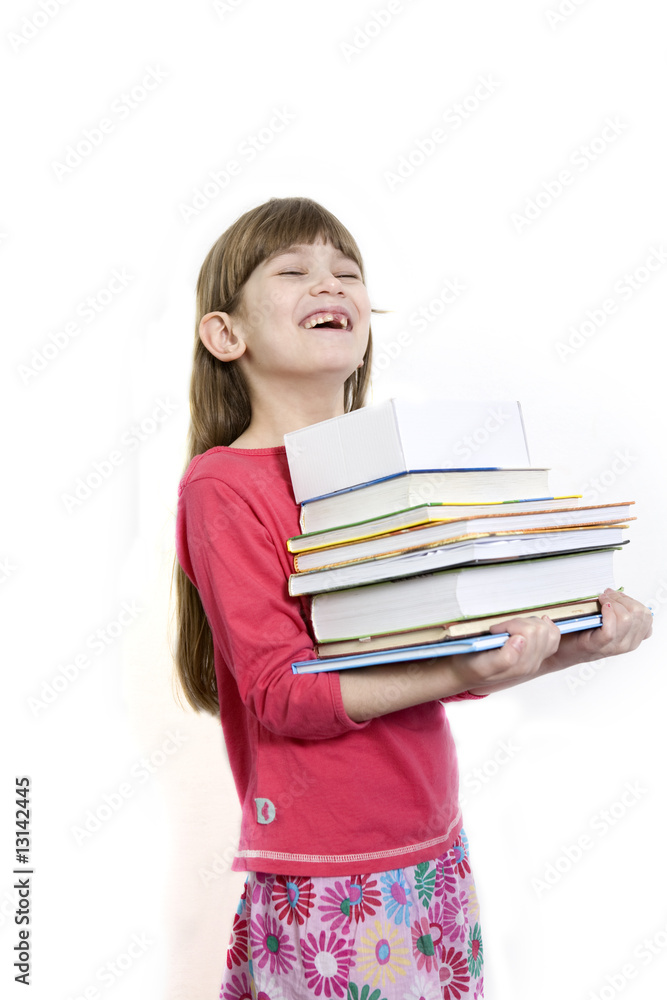 little cute girl seven years old carry books. little cute girl seven years old carry books.