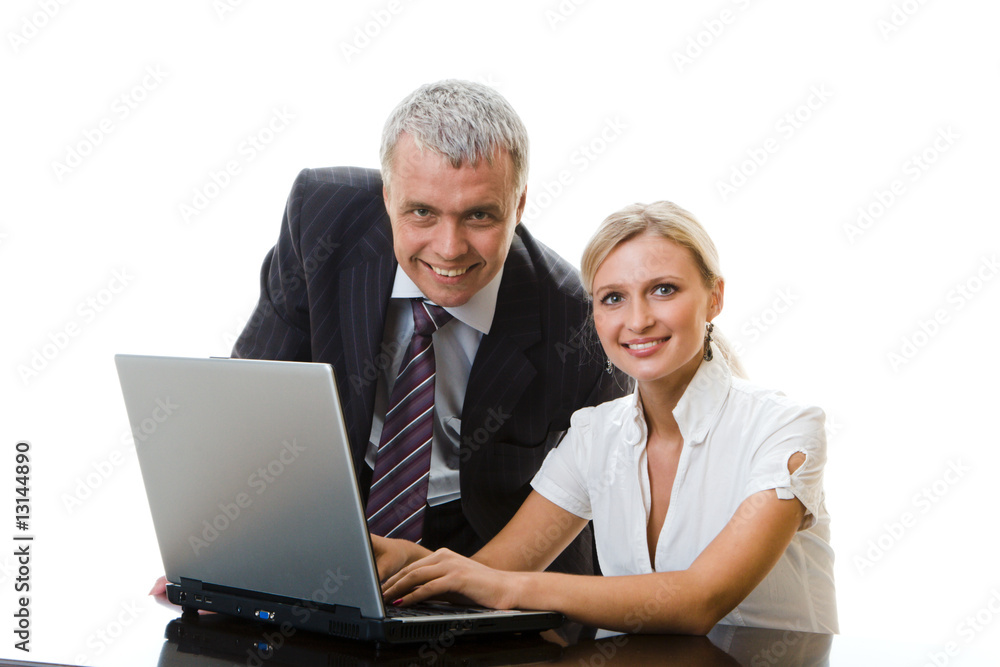 Business colleagues working on laptop together Business colleagues working on laptop together