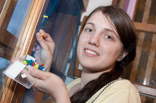 Girl is making mosquito screen photo