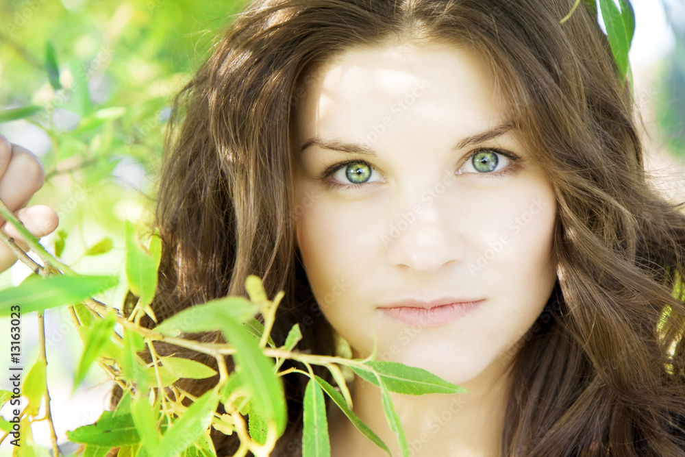 Beautiful girl on the grass in sunny day Beautiful girl on the grass in sunny day