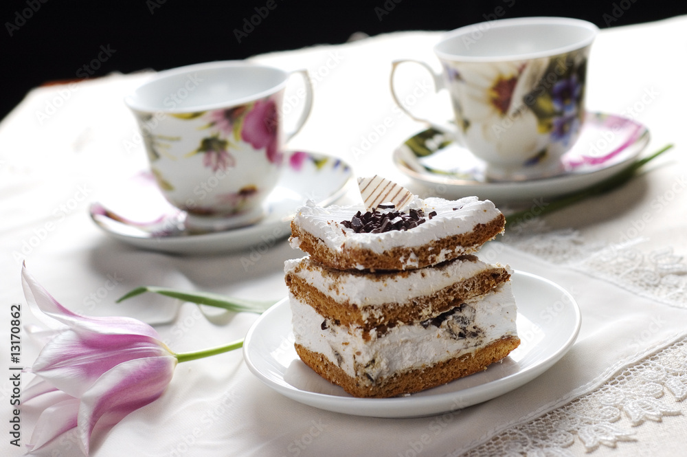 cake and cups of tea cake and cups of tea