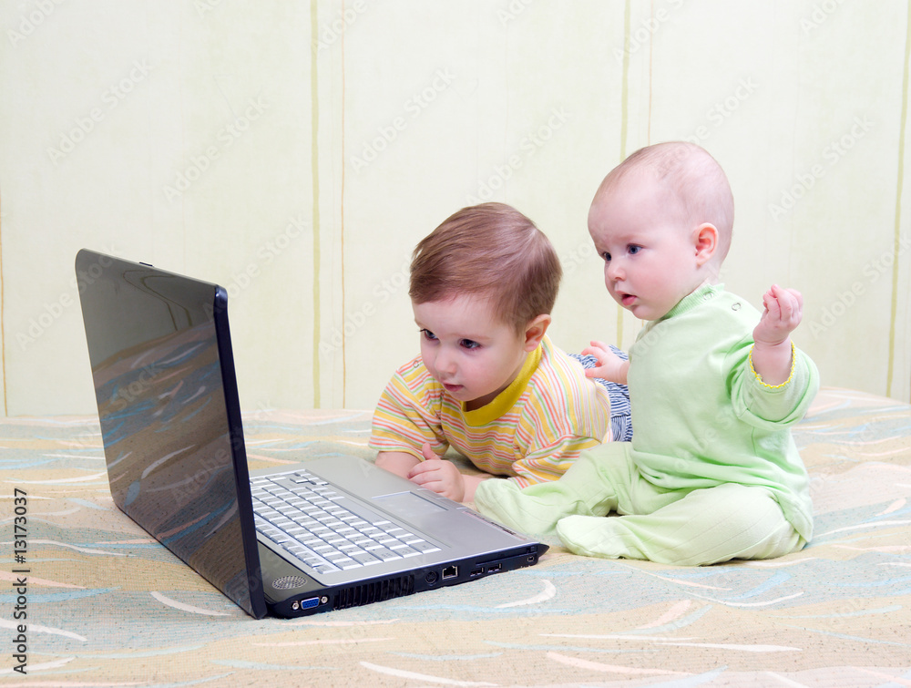 .kids playing computer games .kids playing computer games