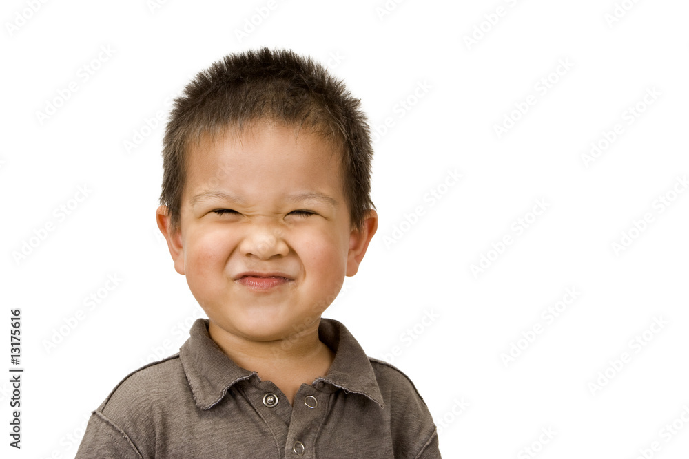 Cute preschool-aged boy with a silly grin on his face Cute preschool-aged boy with a silly grin on his face
