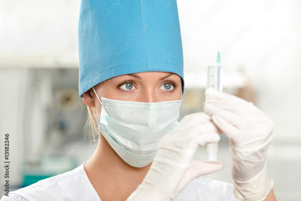 The doctor and a syringe The doctor and a syringe