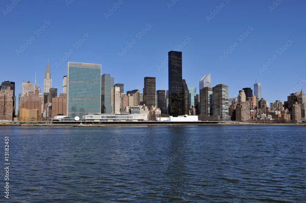 Fototapeta premium Midtown Manhattan skyline on a Clear Blue day.
