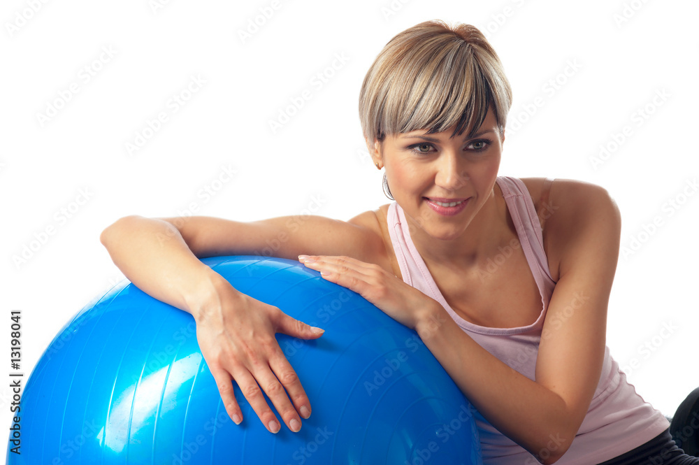 Sportswoman exercising on a Fitness Ball Sportswoman exercising on a Fitness Ball