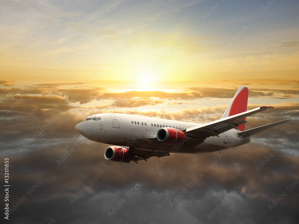 Fototapeta premium Duży samolot o zachodzie słońca