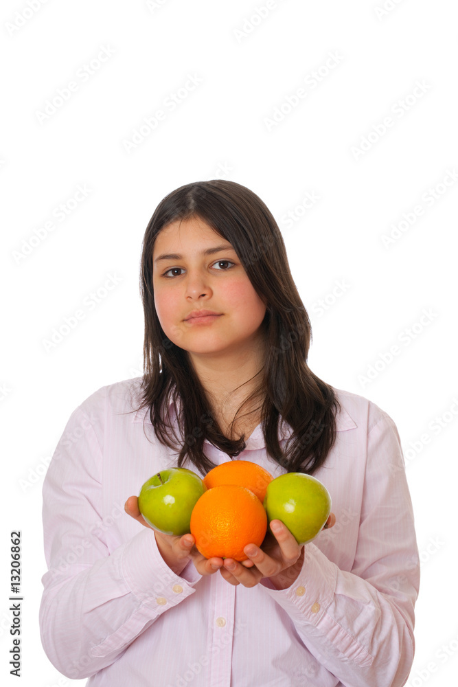 Young girl with apples and oranges Young girl with apples and oranges
