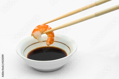Prawn in chopsticks