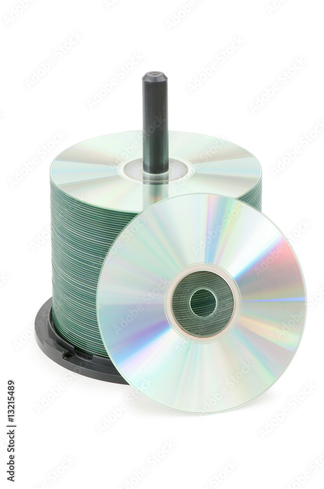Spindle of cd disks isolated on white Spindle of cd disks isolated on white