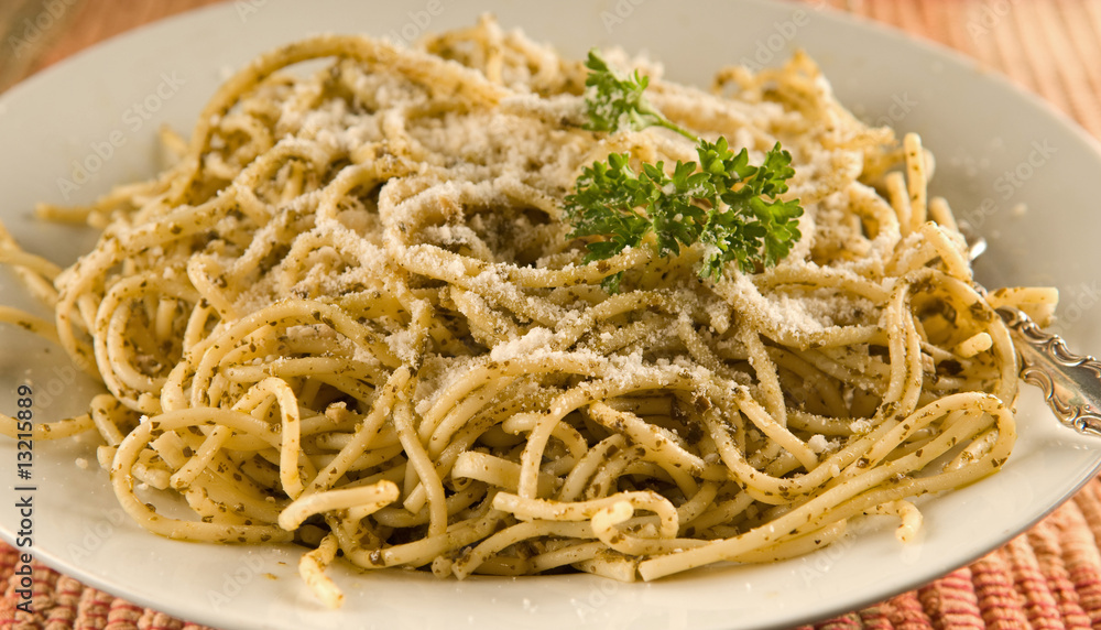 spaghetti with pesto and grated parmesan spaghetti with pesto and grated parmesan