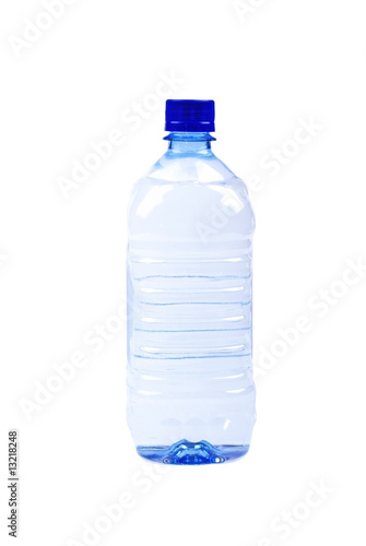 Blue bottle of mineral water isolated on white background.