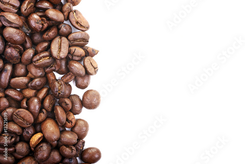 Dark coffee beans isolated on white background.