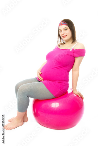 pregnant woman with a fitmess ball