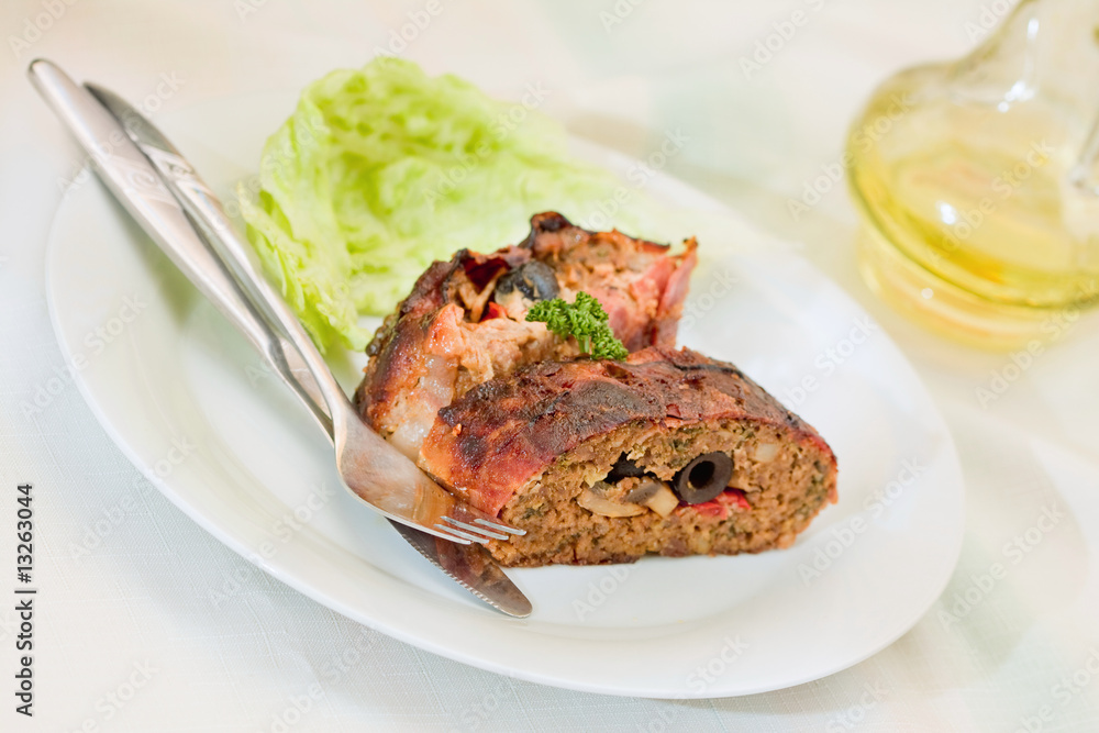 sliced fillet meat - stuffed black olives and mushrooms sliced fillet meat - stuffed black olives and mushrooms