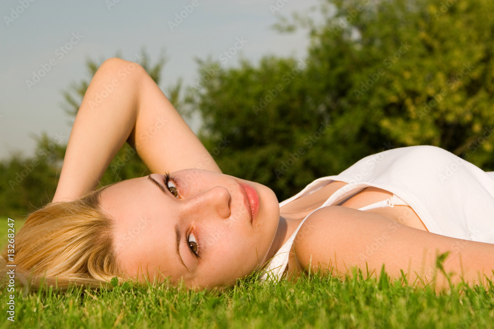sweet woman rest on the grass sweet woman rest on the grass
