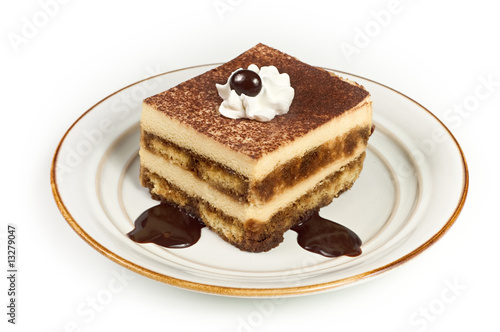 Sweet Italian Layered Tiramisu Cake on Dessert Plate