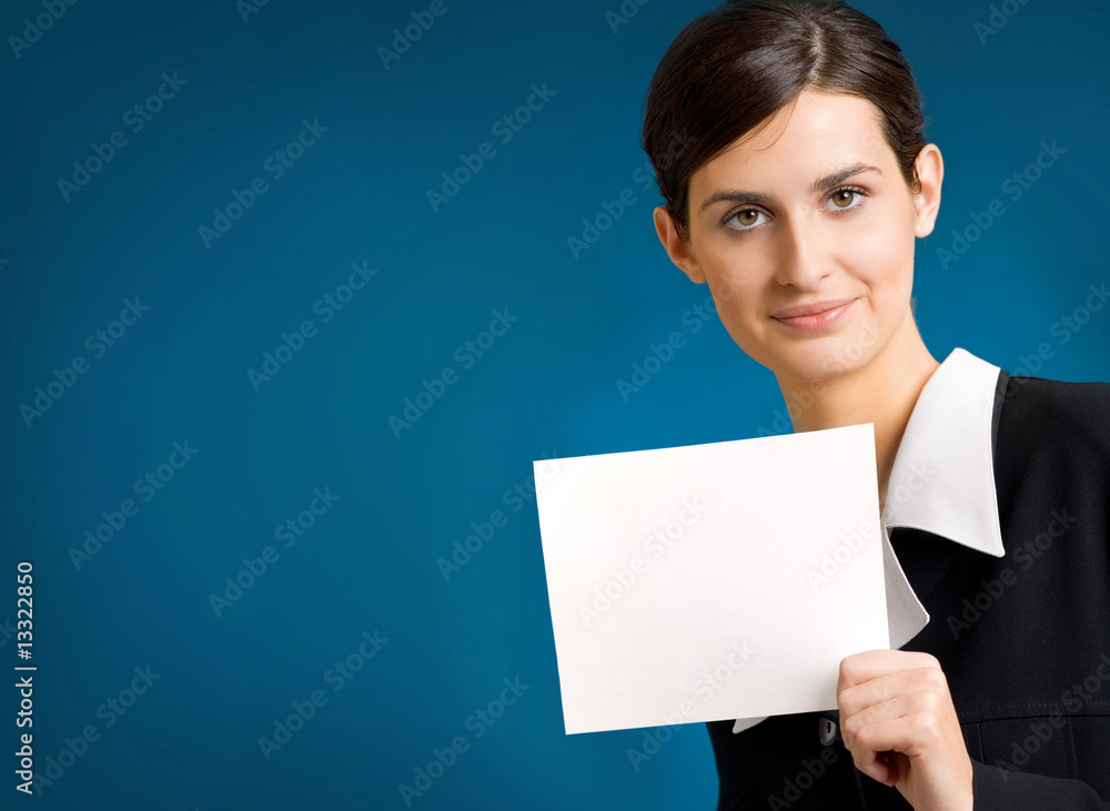 Young smiling successful business lady with blank sign Young smiling successful business lady with blank sign