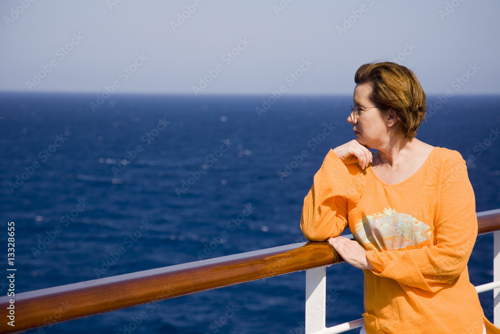 Fototapeta premium Woman at the rail of a cruise ship