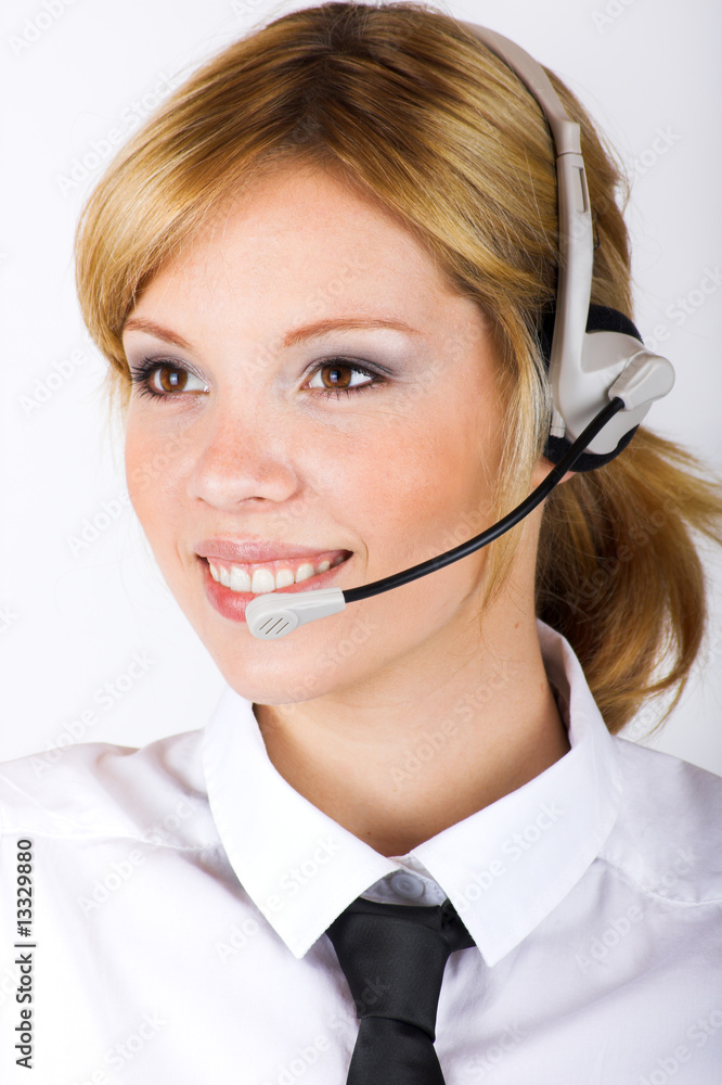 young successful business woman is calling with a headset young successful business woman is calling with a headset