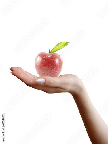 red apple in a female hand on white