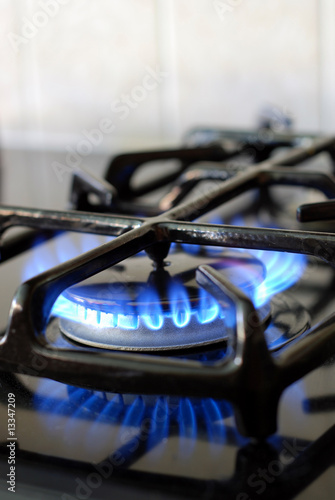 Burning gas oven in kitchen