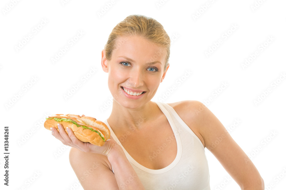 Young woman in fitness wear with sandwich, isolated Young woman in fitness wear with sandwich, isolated
