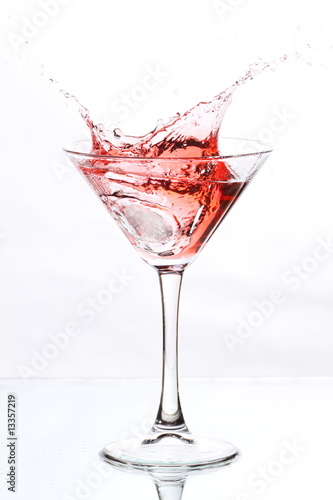 red cocktail on white