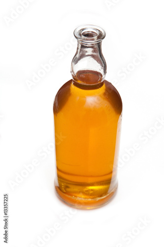 Bottle of Scotch whiskey isolated on a white studio background.