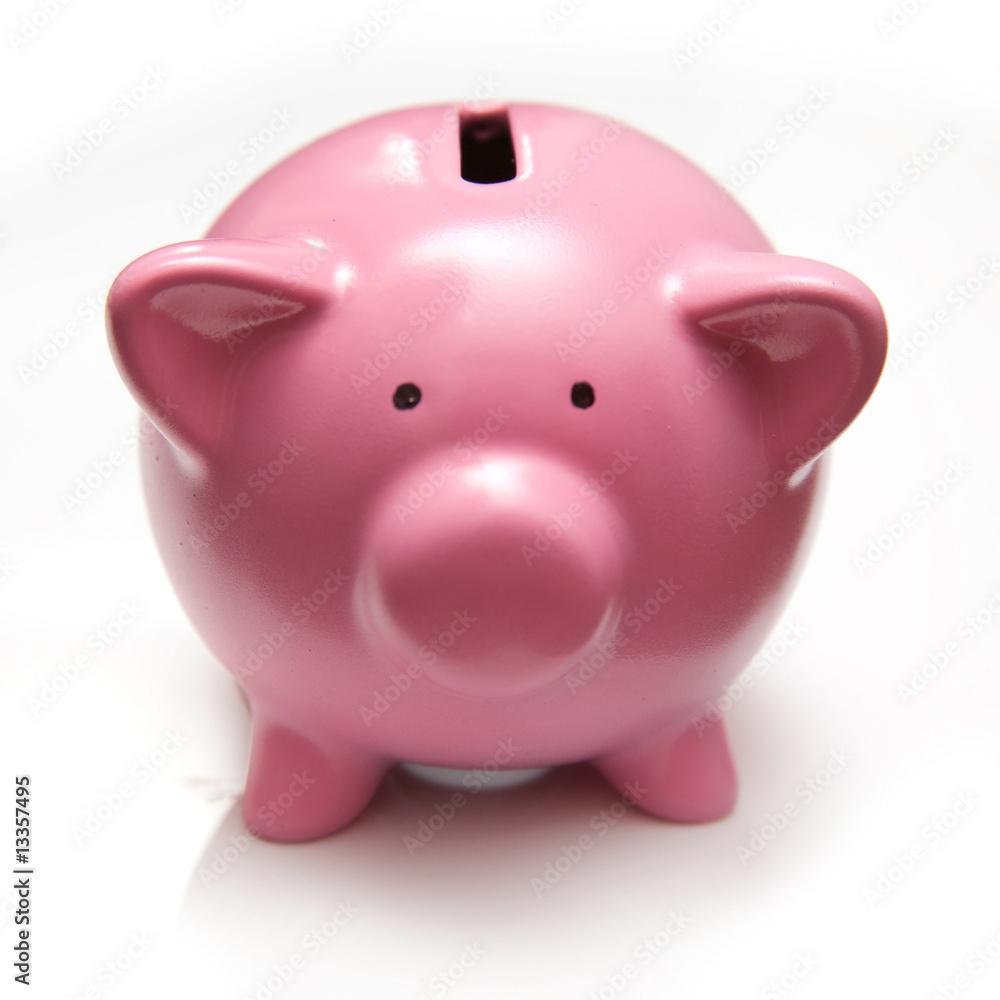 Piggy bank style money box isolated on a white background. Piggy bank style money box isolated on a white background.