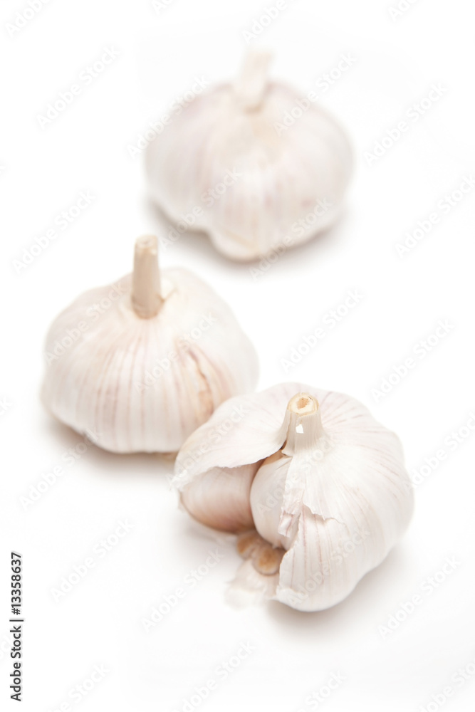 Garlic isolated on a white studio background. Garlic isolated on a white studio background.