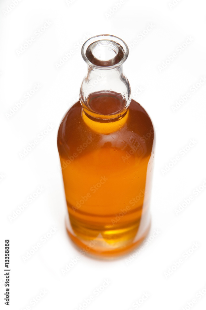 Bottle of Scotch whiskey isolated on a white studio background. Bottle of Scotch whiskey isolated on a white studio background.