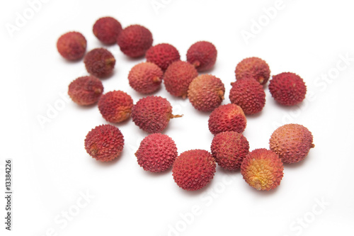 Lychees isolated on a white studio background.