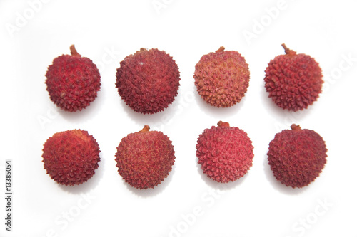 Lychees isolated on a white studio background.