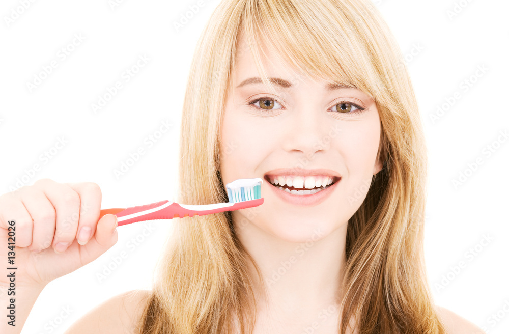 happy girl with toothbrush