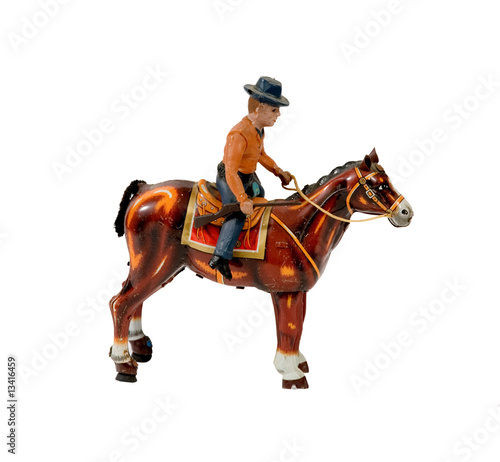 ANTIQUE TIN COWBOY WITH HORSE