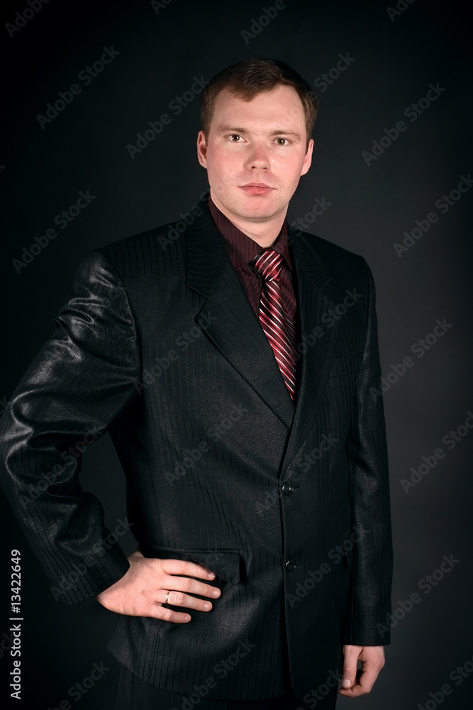 young man on a black background young man on a black background