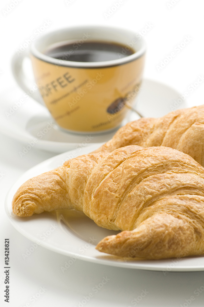 delicious continental breakfast of coffee and croissants