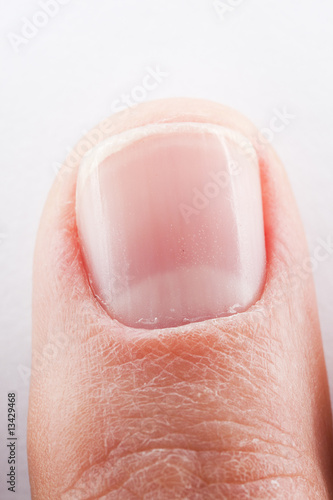 mans finger on white