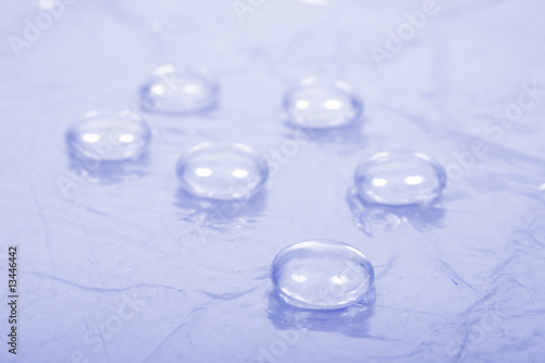 Water drops on blue background.