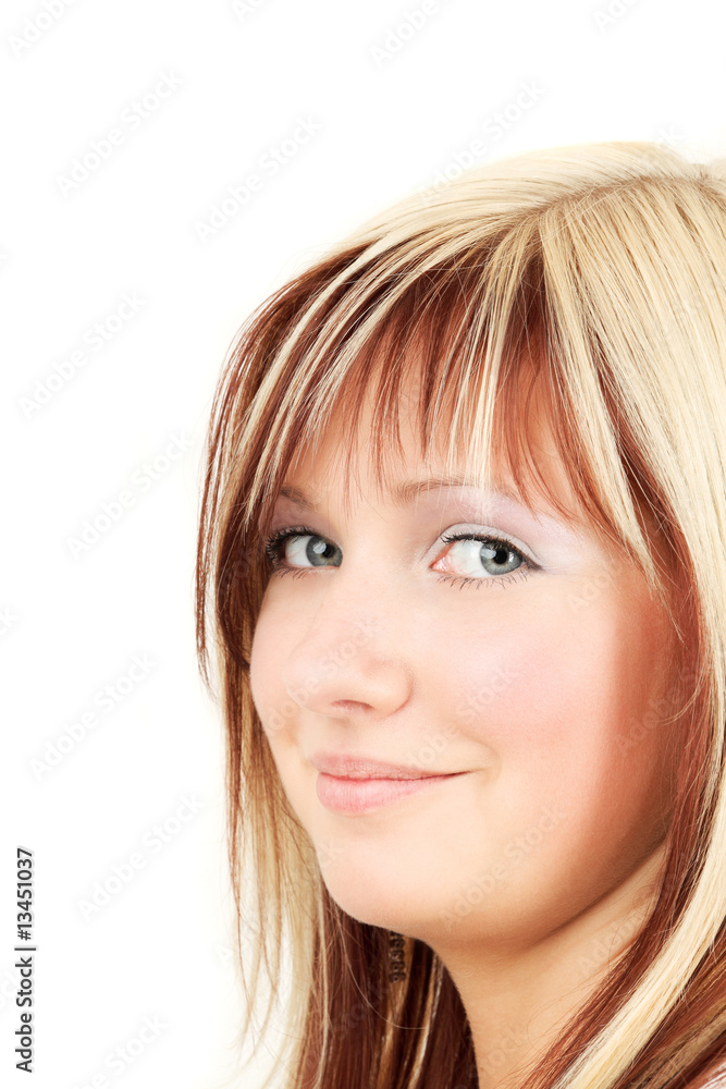 Side view portrait of young smiling blonde woman, studio shot Side view portrait of young smiling blonde woman, studio shot