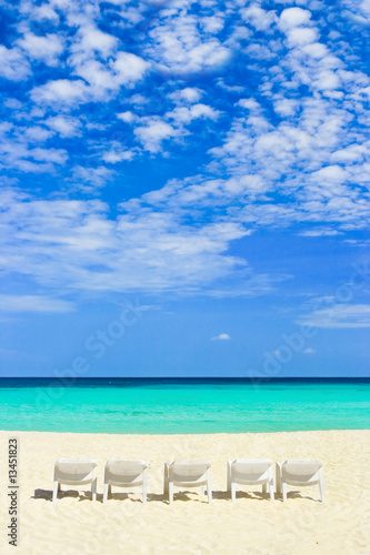 Fototapeta Naklejka Na Ścianę i Meble -  Chairs on tropical beach