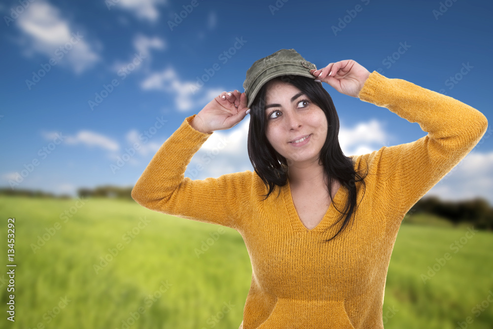 beautiful young woman smiling outdoors