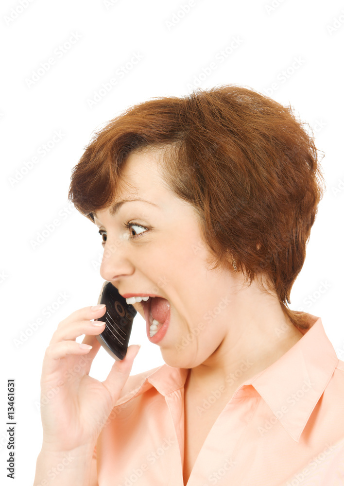Screaming girl with mobile phone isolated