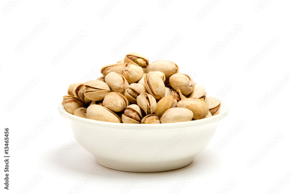 Pistachios with shell on white background Pistachios with shell on white background
