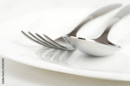 Photo of fork and spoon on plate