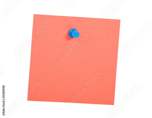 Red reminder note with blue pin