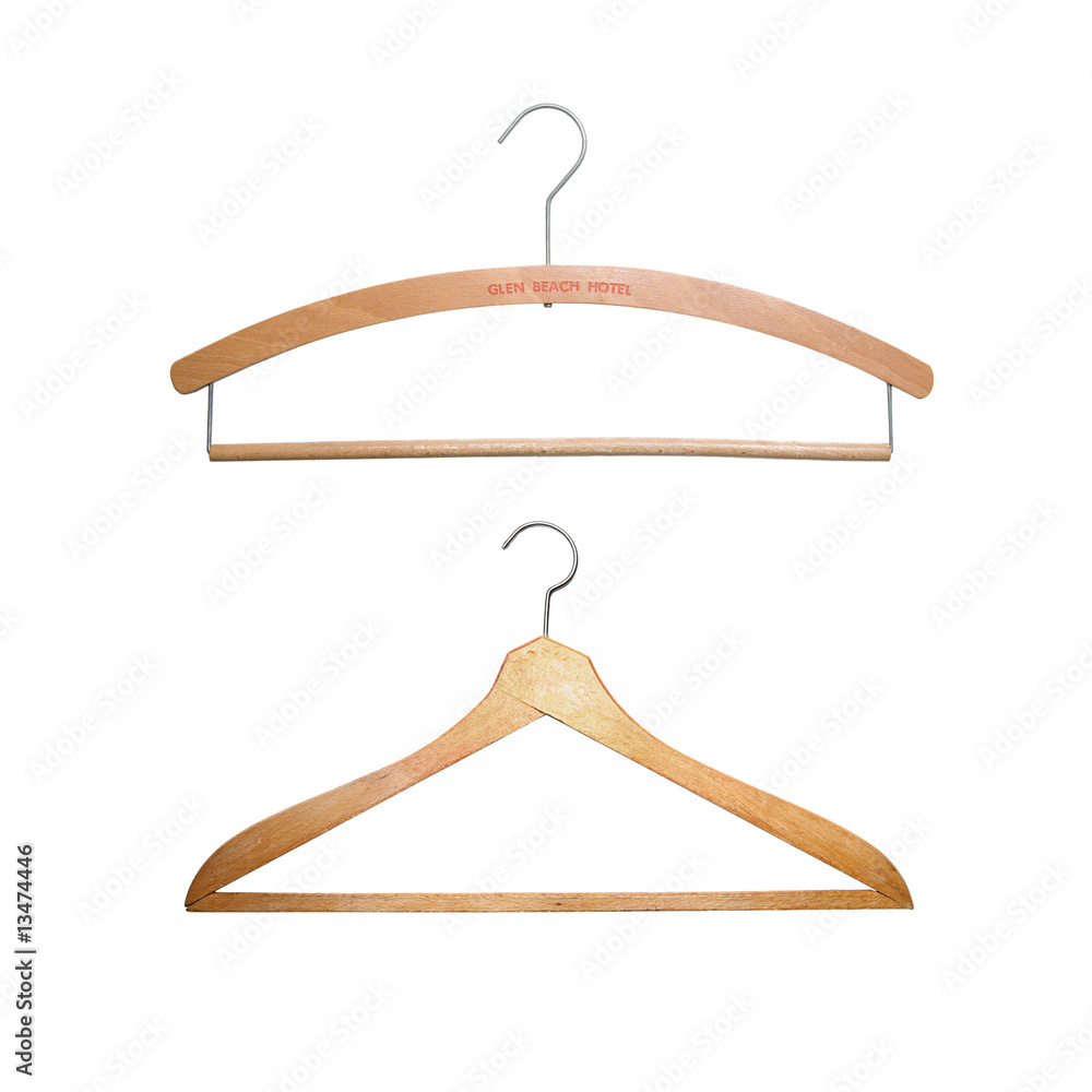 two old-fashioned wooden hangers isolated on white two old-fashioned wooden hangers isolated on white