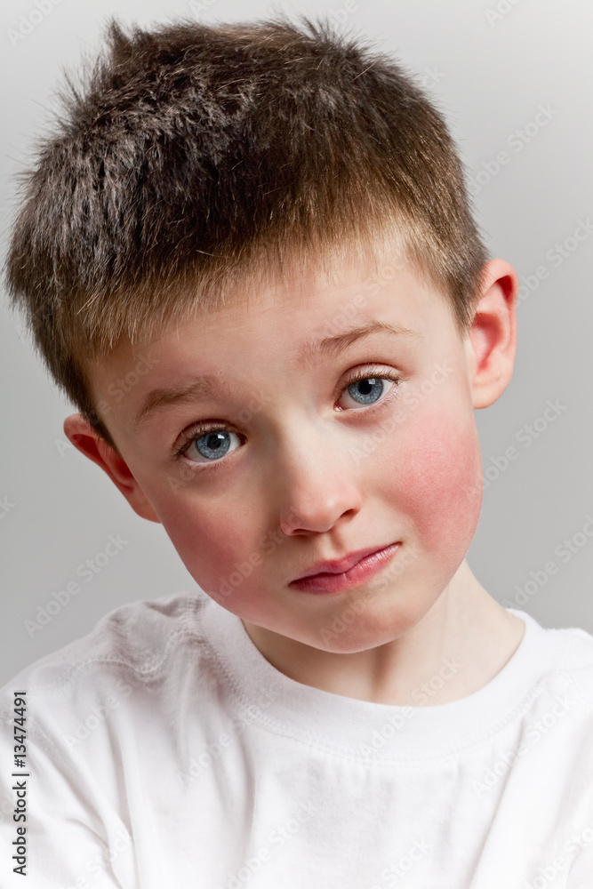 Sad little boy looking to camera Sad little boy looking to camera