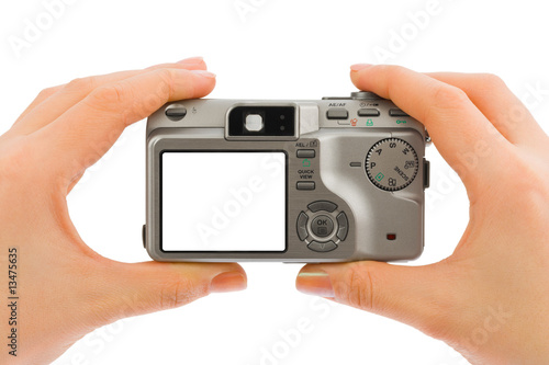Photo camera in hands